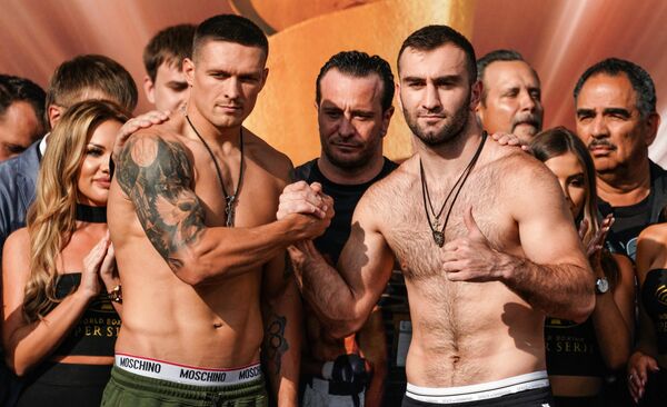 Слева направо: Александр Усик (Украина) и Мурат Гассиев (Россия)  - Sputnik Беларусь