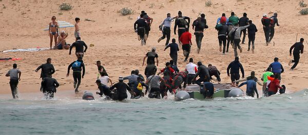 Мигранты достигли южного побережья Испании - Sputnik Беларусь