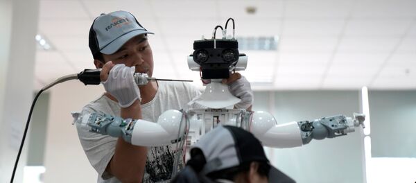 Создание роботов, архивное фото Создание роботов, архивное фото - Sputnik Беларусь