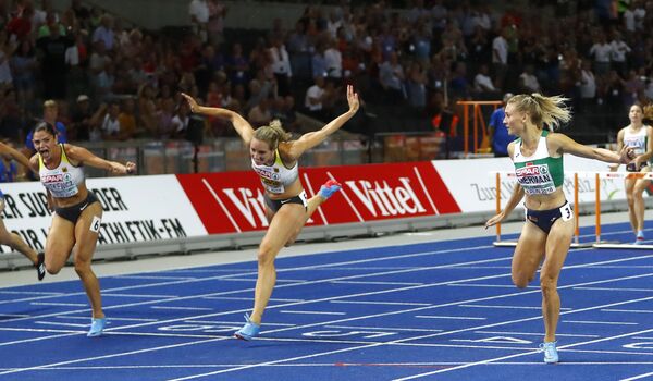 Эльвира Герман (справа) на финише - Sputnik Беларусь