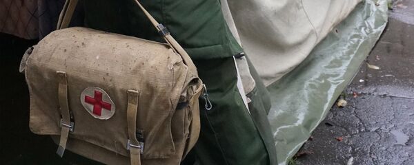 Военный медик, архивное фото Военный медик, архивное фото - Sputnik Беларусь