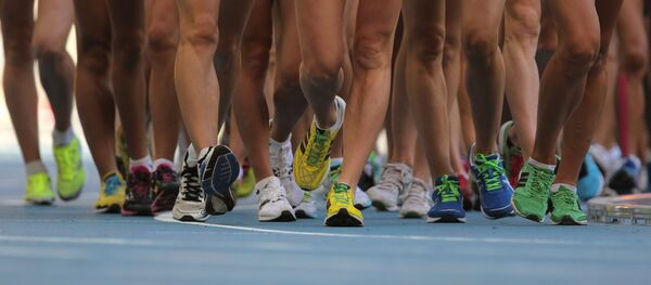 Спортсменки в соревнованиях по спортивной ходьбе на дистанции 20 км - Sputnik Беларусь