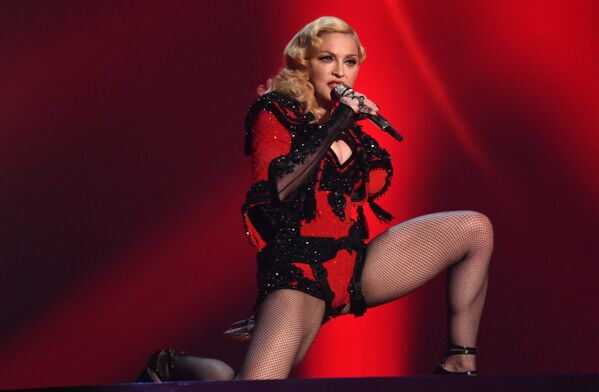 Тур в поддержку альбома Rebel Heart Tour сделал Мадонну рекордсменом среди сольных исполнителей по сумме выручки с проданных билетов. - Sputnik Беларусь