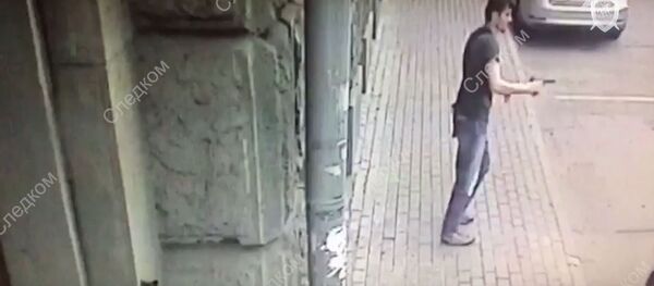 Неизвестный расстрелял полицейских в центре Москвы, видео - Sputnik Беларусь