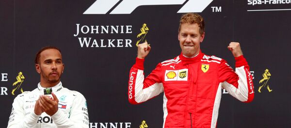 Немецкий пилот Феррари Себастьян Феттель - Sputnik Беларусь