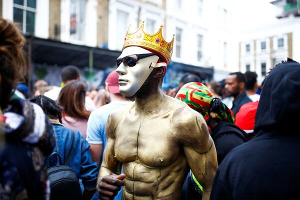 Посетители карнавала в Ноттинг-Хилле, Лондон - Sputnik Беларусь