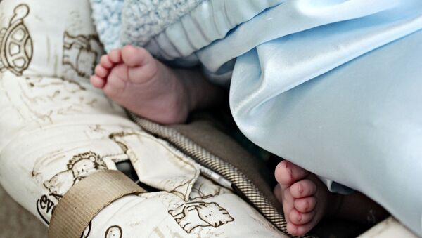 Младенец в автокресле, архивное фото - Sputnik Беларусь