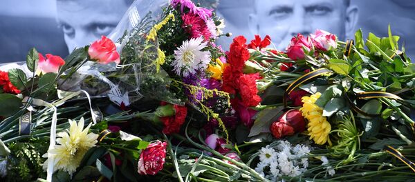 Траурная акция в память о погибшем главе ДНР Александре Захарченко Траурная акция в память о погибшем главе ДНР Александре Захарченко - Sputnik Беларусь