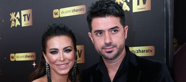 Певица Ани Лорак с супругом Муратом Налчаджиоглу, архивное фото - Sputnik Беларусь