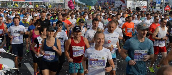 В этом году в полумарафоне принимают участие около 35 тысяч человек В этом году в полумарафоне принимают участие около 35 тысяч человек - Sputnik Беларусь