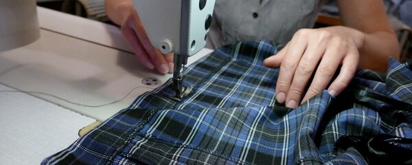 Швея за работой, архивное фото - Sputnik Беларусь