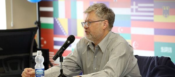 Профессор политологии университета штата Теннеси (США) Андрей Коробков Профессор политологии университета штата Теннеси (США) Андрей Коробков - Sputnik Беларусь