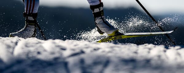 Спортсменка на дистанции масс-старта среди женщин - Sputnik Беларусь