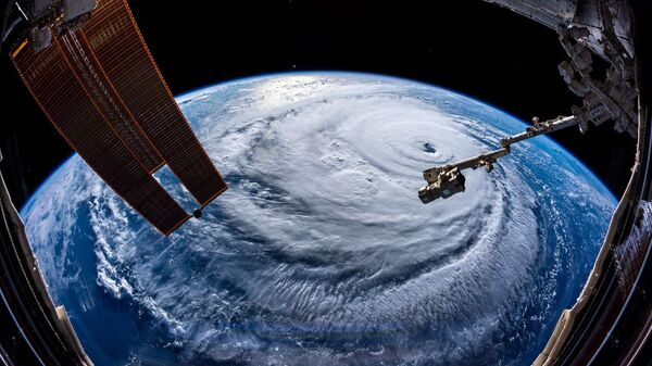 Ураган Флоренс, сфотографированный астронавтом Александром Герстом с МКС - Sputnik Беларусь