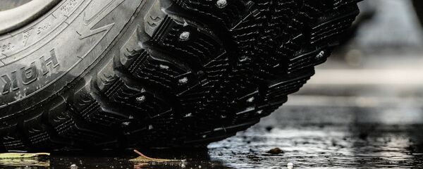 Колесо автомобиля, архивное фото Колесо автомобиля, архивное фото - Sputnik Беларусь