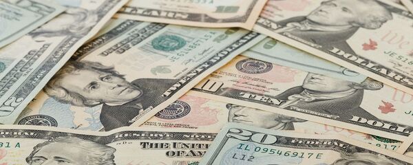 Долары, архіўнае фота Долары, архіўнае фота - Sputnik Беларусь