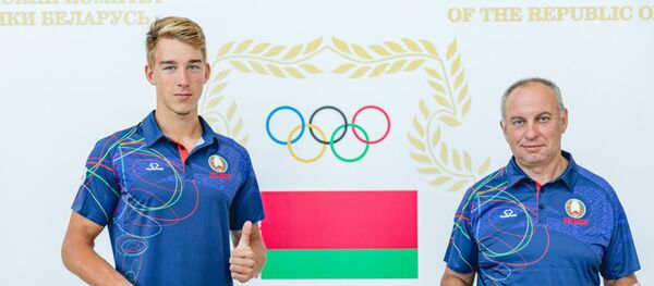 Беларускі вясляр Іван Брынза з трэнерам Юрыем Залатаровым - Sputnik Беларусь