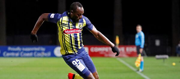 Восьмикратный олимпийский чемпион по легкой атлетике Усэйн Болт Восьмикратный олимпийский чемпион по легкой атлетике Усэйн Болт - Sputnik Беларусь