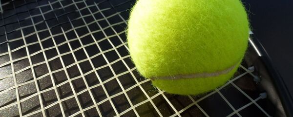 Тэнісная ракетка, архіўнае фота Тэнісная ракетка, архіўнае фота - Sputnik Беларусь