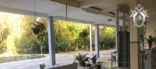 Следователи СК РФ осмотрели место происшествия в керченском колледже - Sputnik Беларусь