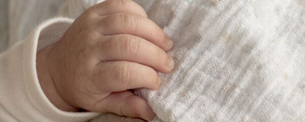Рука младенца, архивное фото - Sputnik Беларусь
