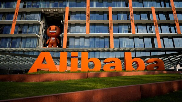 Логотип китайской публичной компании Alibaba Group - Sputnik Беларусь