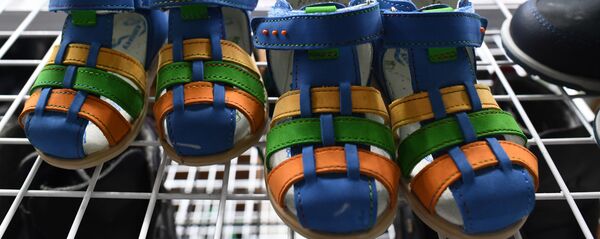 Детская обувьв магазине - Sputnik Беларусь