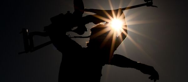 Биатлонист на дистанции, архивное фото - Sputnik Беларусь