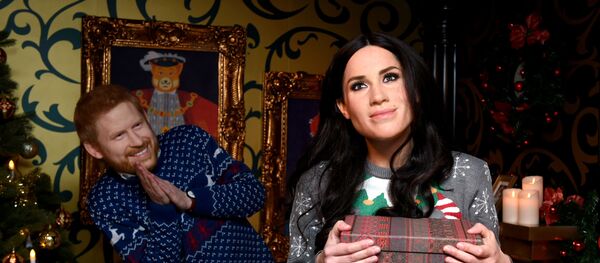 Восковые фигуры принца Гарри и его супруги Меган Маркл, герцогов Сассекских, в музее мадам Тюссо - Sputnik Беларусь