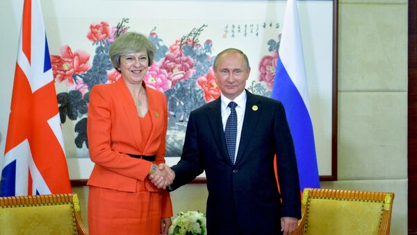 Президент РФ Владимир Путин и премьер-министр Великобритании Тереза Мэй - Sputnik Беларусь