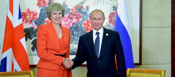 Президент РФ Владимир Путин и премьер-министр Великобритании Тереза Мэй - Sputnik Беларусь