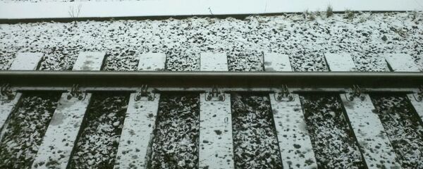 Рельсы в снегу, архивное фото - Sputnik Беларусь