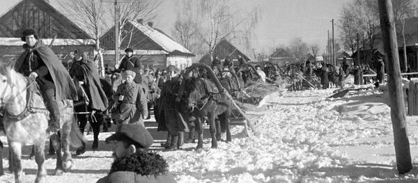 Партизанское соединение Сидора Ковпака в освобожденном селе Малковичи, 1943 год Партизанское соединение Сидора Ковпака в освобожденном селе Малковичи, 1943 год - Sputnik Беларусь