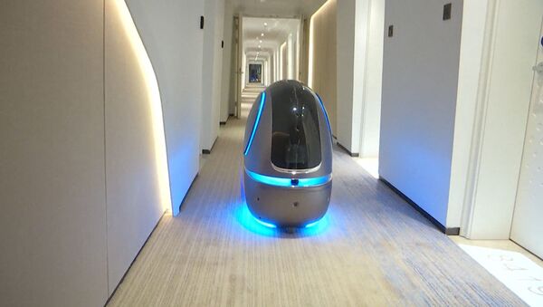 Вкалывают роботы, а не человек: отель будущего открылся в Китае - Sputnik Беларусь
