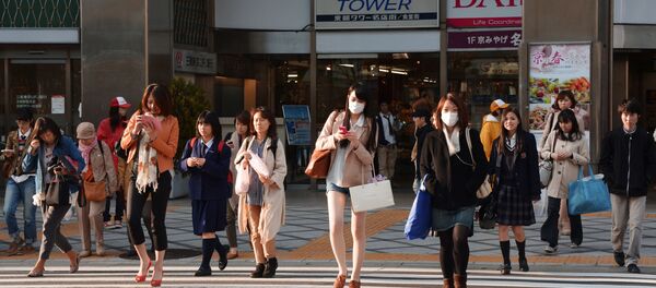 Жители города Киото на пешеходном переходе Жители города Киото на пешеходном переходе - Sputnik Беларусь