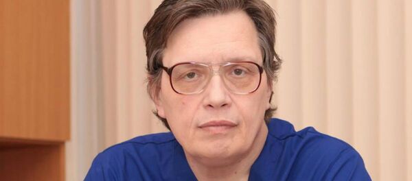 Врач неотложной помощи, в прошлом врач российской сборной по прыжкам на лыжах с трамплина Андрей Звонков - Sputnik Беларусь