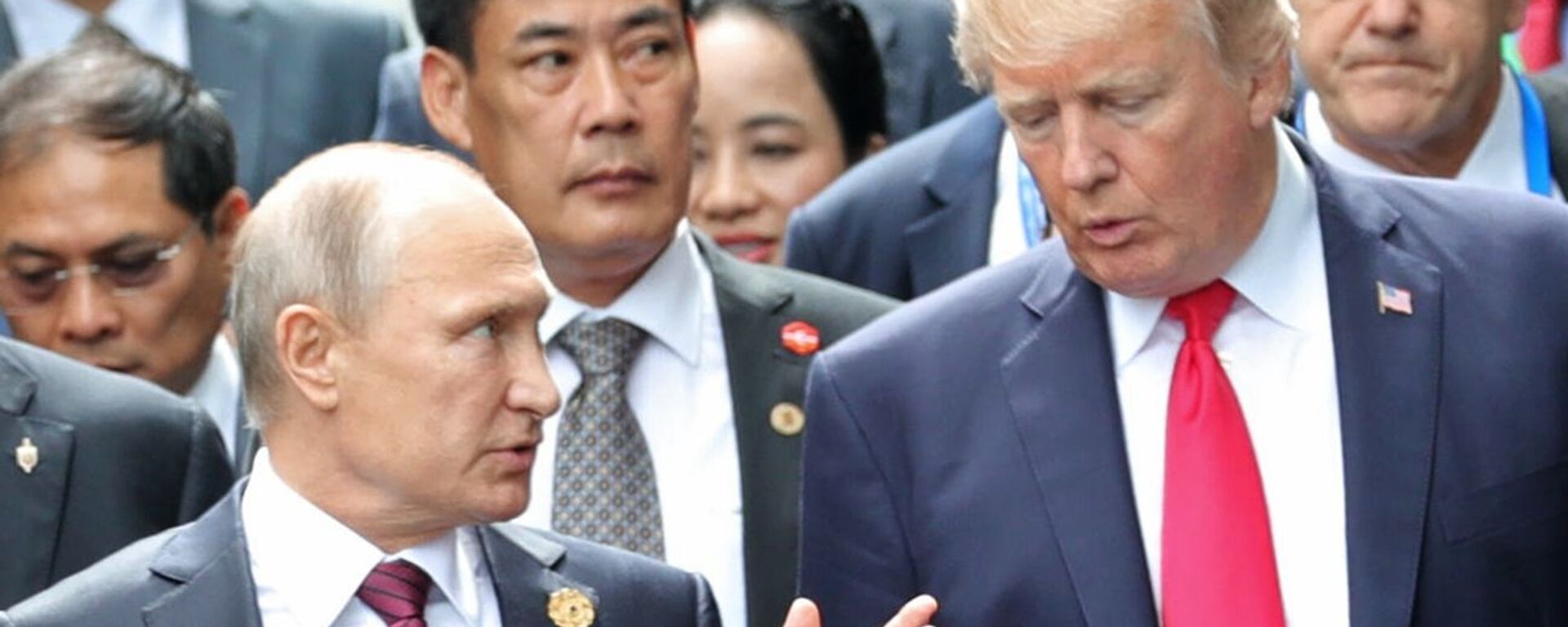 Президент РФ Владимир Путин и президент США Дональд Трамп  - Sputnik Беларусь, 1920, 09.08.2025
