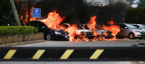 Горящие автомобили у отеля Dusit в Найроби - Sputnik Беларусь