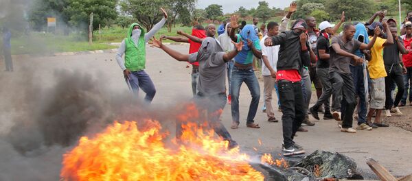 Протесты в Хараре, Зимбабве, в январе 2019 - Sputnik Беларусь