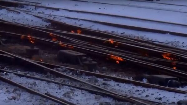 Железнодорожники в Чикаго из-за мороза вынуждены поджигать рельсы  - Sputnik Беларусь
