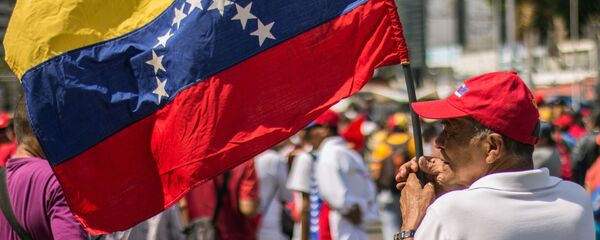 Акция в поддержку президента Венесуэлы Николаса Мадуро - Sputnik Беларусь