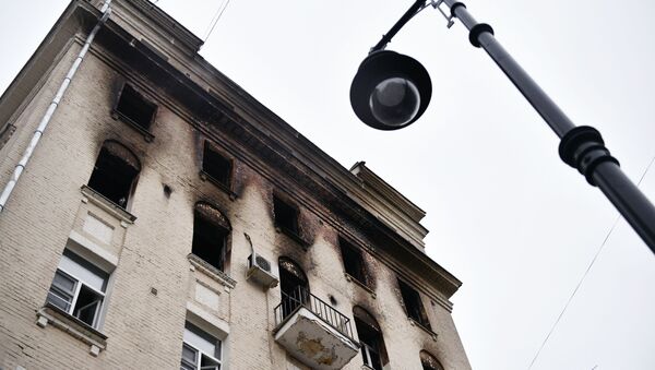 Пожар в жилом доме на Никитском бульваре в Москве - Sputnik Беларусь