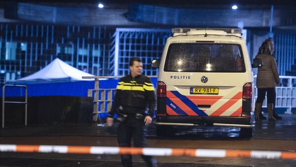 Полиция на месте стрельбы у центрального банка страны в Амстердаме 6 февраля 2019 года. - Sputnik Беларусь