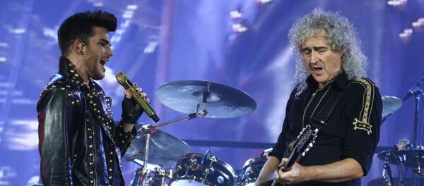 Адам Ламберт и Брайан Мэй Адам Ламберт и Брайан Мэй - Sputnik Беларусь