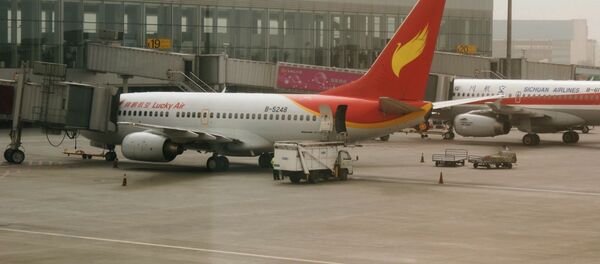 Самолет компании Lucky Air  - Sputnik Беларусь