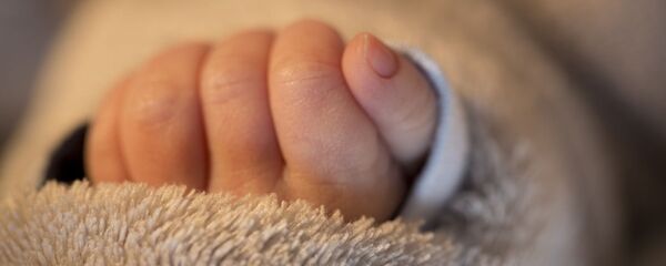 Младенец, архивное фото Младенец, архивное фото - Sputnik Беларусь