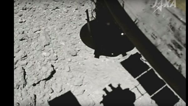 Японский зонд Хаябуса-2 обстрелял астероид Рюгу, видео - Sputnik Беларусь