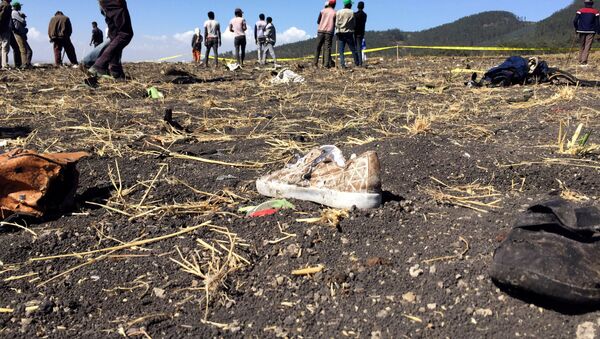На месте крушения самолета Boeing 737 авиакомпании Ethiopian Airlines  - Sputnik Беларусь