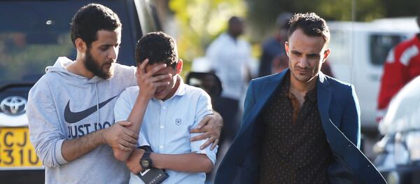 Родственники пассажиров самолета Ethiopian Airlines в  Международном аэропорту имени Джомо Кениаты (JKIA) в Найроби, Кения - Sputnik Беларусь