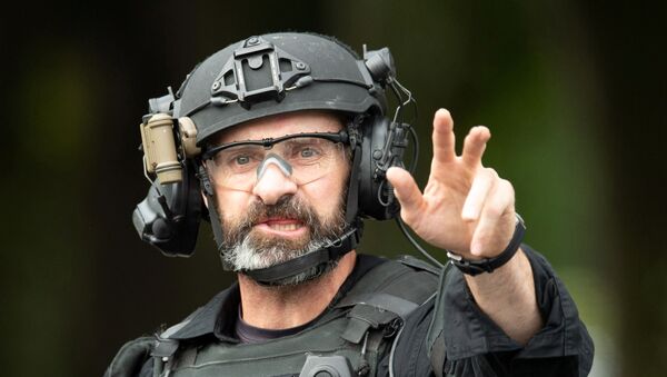 Сотрудник AOS (Armed Offenders Squad) после стрельбы в мечети Аль-Нур в Крайстчерче, Новая Зеландия, 15 марта 2019 года - Sputnik Беларусь